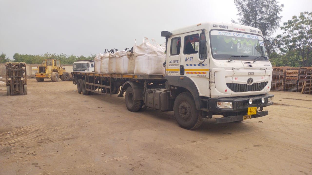 M.L. Enterprises transport fleet loaded with fly ash